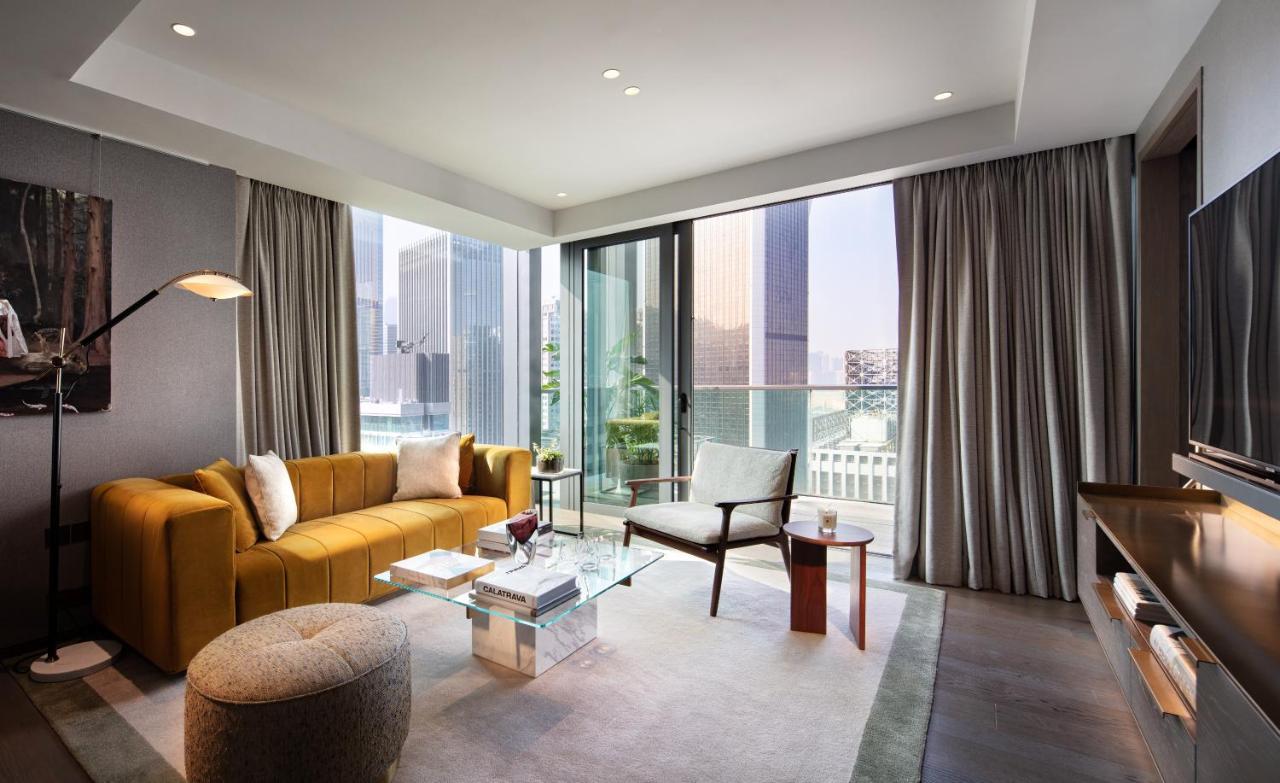 The Hari Hong Kong Hotel Exterior foto The living room of a two-bedroom apartment