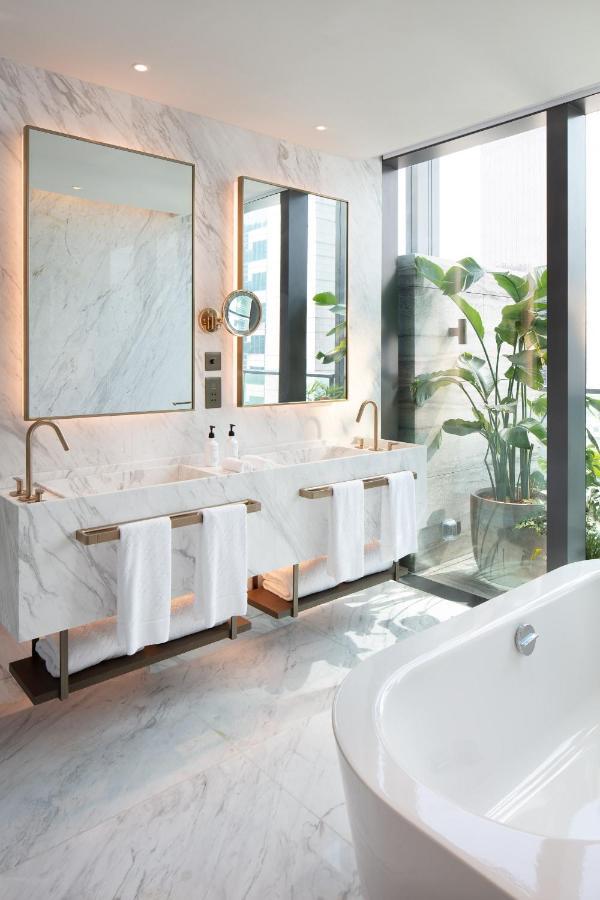 The Hari Hong Kong Hotel Exterior foto Bathroom